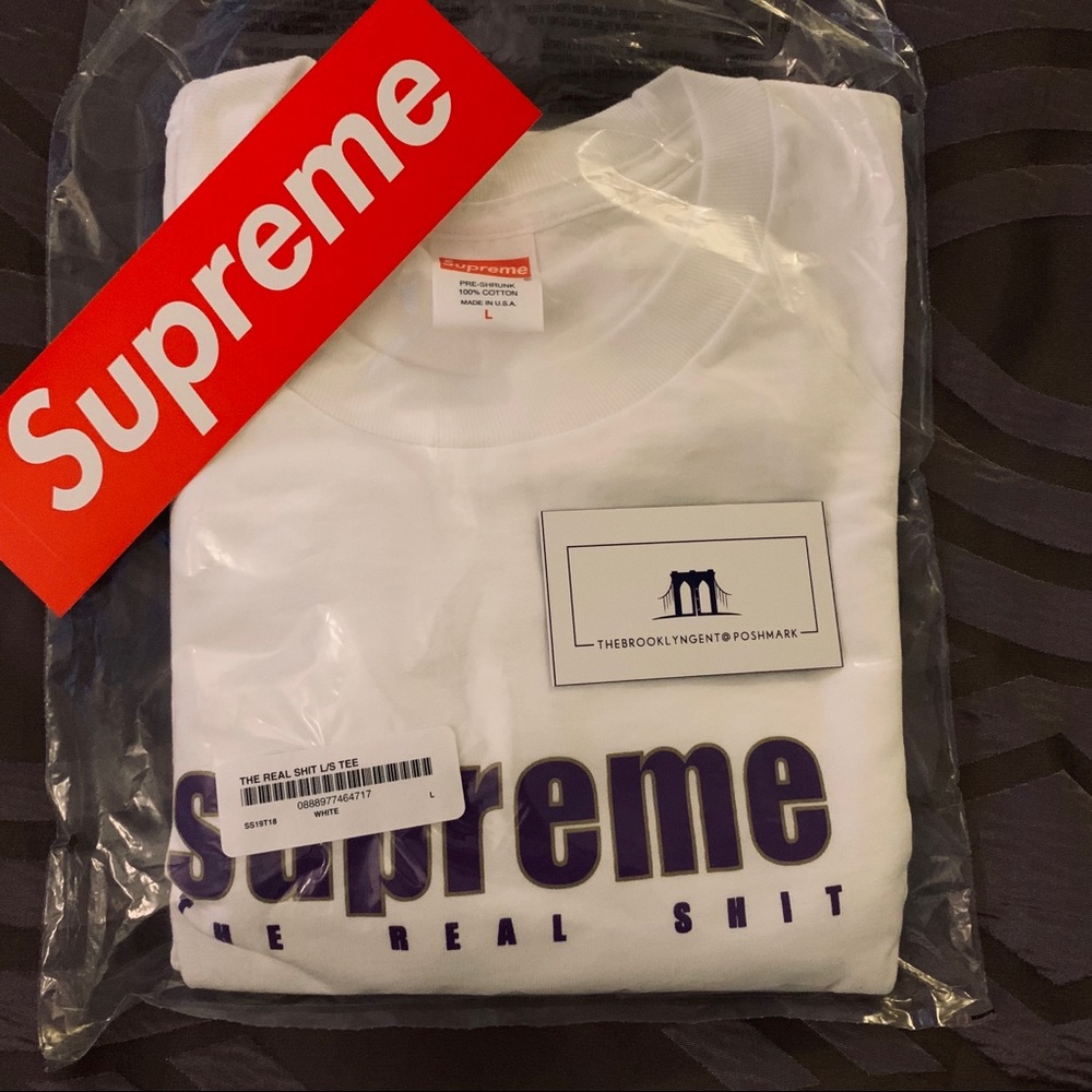 SOLD Supreme “real shit” white t shirt w/ sticker